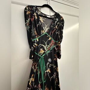 Stunning black printed long maxi dress. Very flattering in good condition.